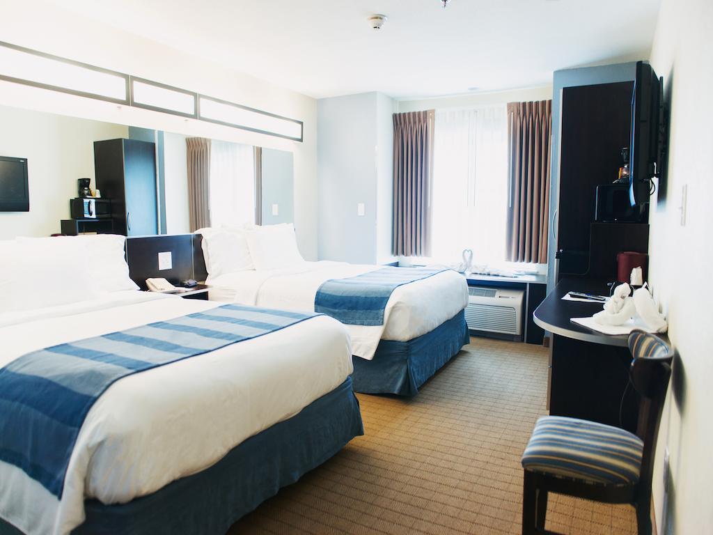 Three Rivers Inn & Suites Порт-Артур Экстерьер фото